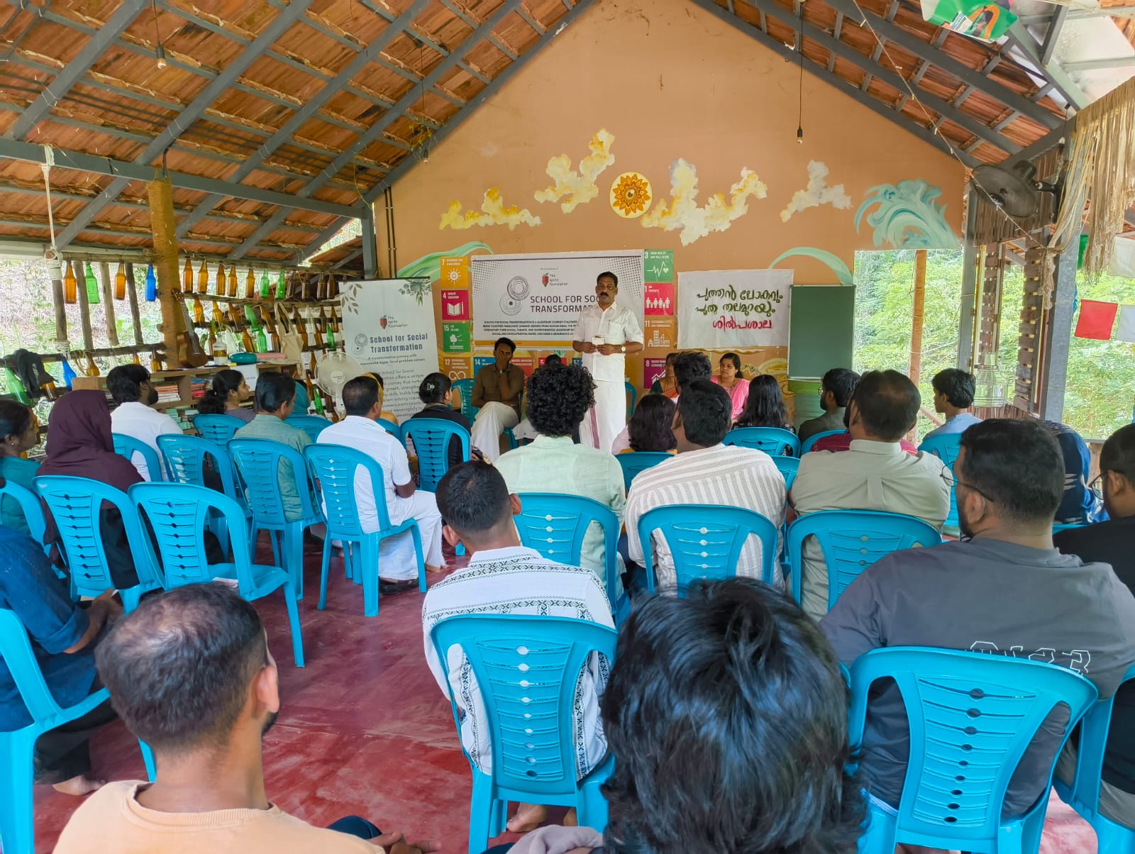 Community leader addressing participants at the Changemakers Ashram